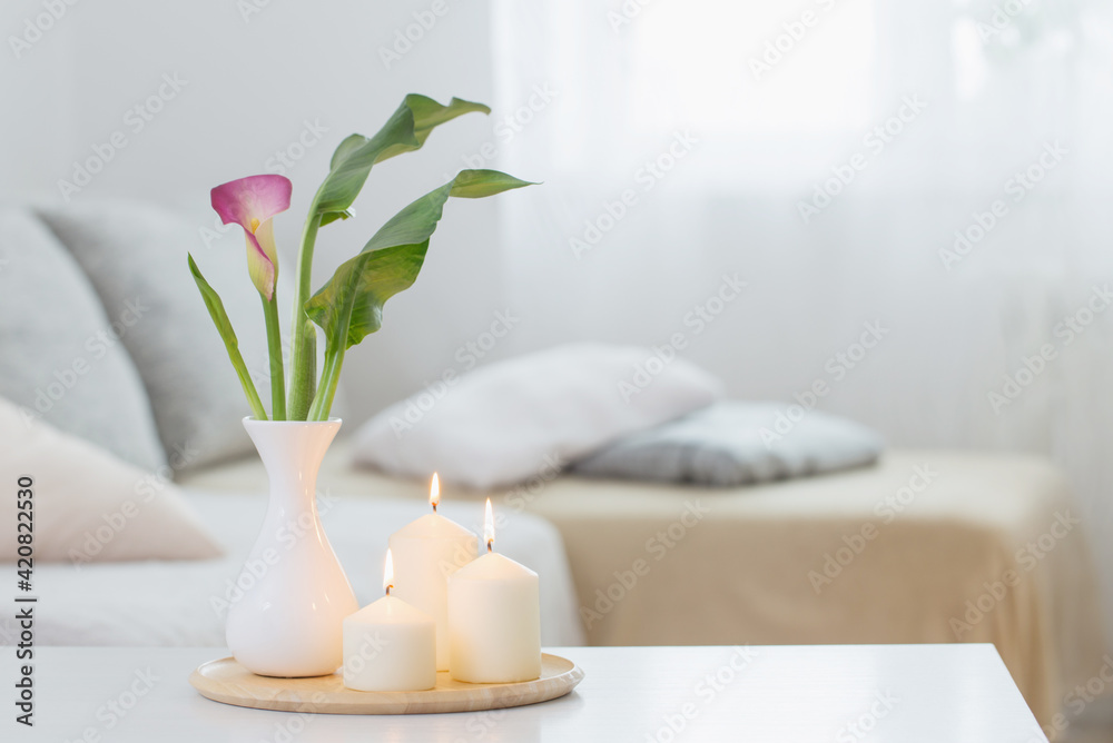 flowers in vase on white table indoor