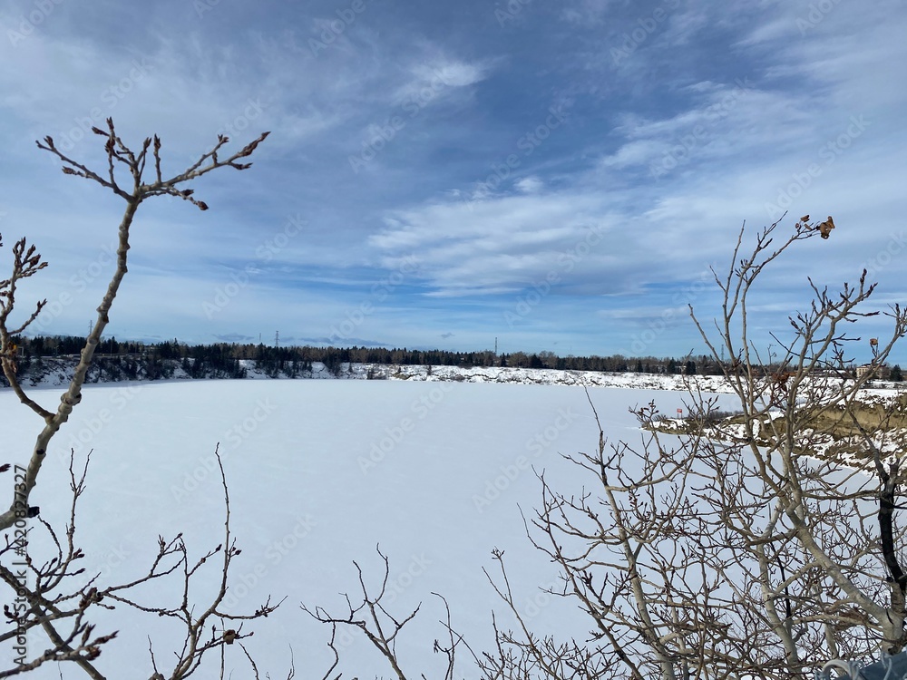 Snow on the ice of Glenmore Reservoir in Calgary Alberta Snow on the ice of Glenmore Reservoir in Calgary Alberta