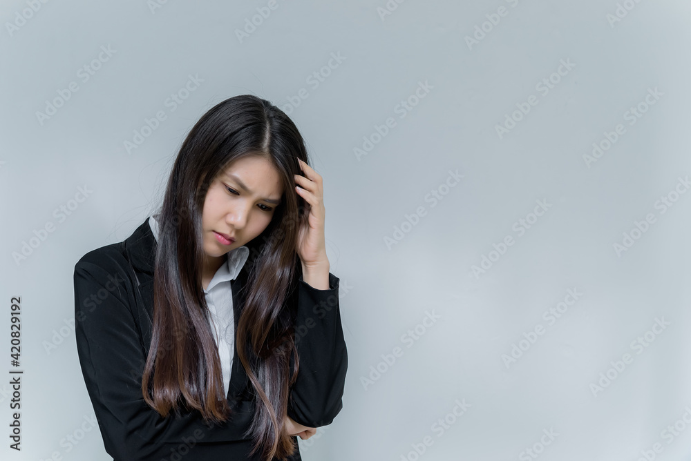 Portrait of beautiful asian business woman wear white shirt on white background,Thailand people,Woman think concept Portrait of beautiful asian business woman wear white shirt on white background,Thailand people,Woman think concept