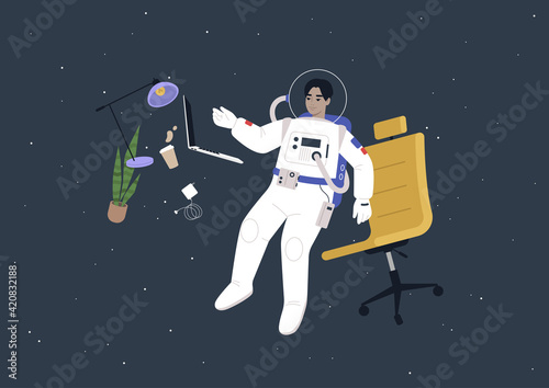 A young male Asian astronaut in a spacesuit working on their laptop in outer space, a futuristic life concept
