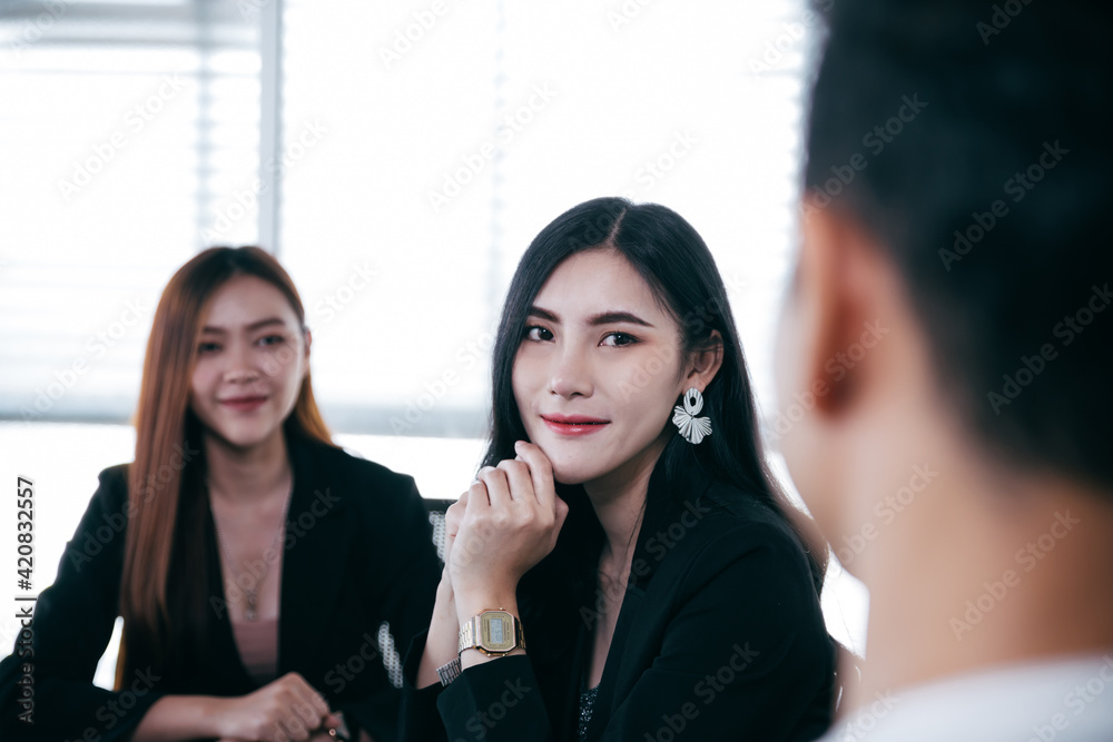 Group of Asian business woman meeting in room