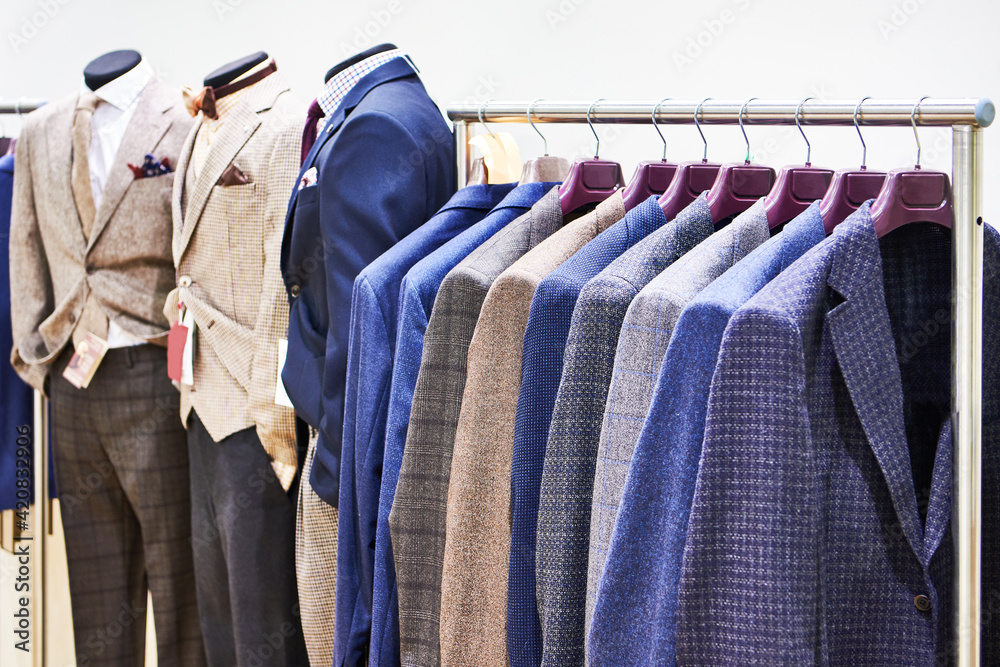 Obraz premium Men's suits in clothing store