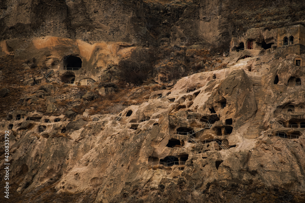 Fototapeta premium Vardzia Cave Monastery in winter, cave city, famous landmark in Georgia