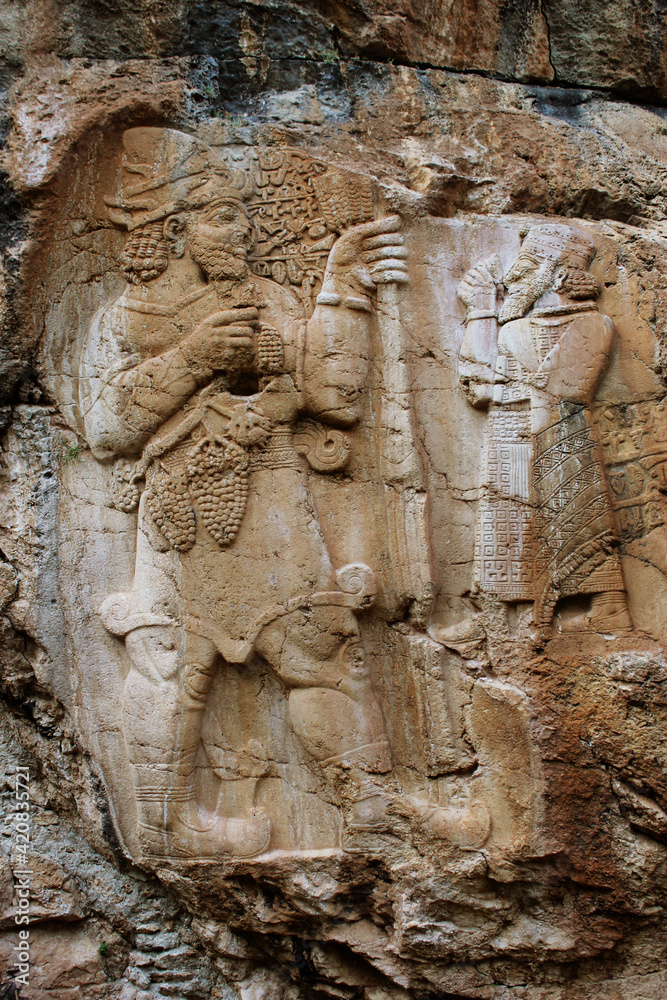 The world's first agricultural rock relief.The Storm God Tarhundas and the king of the region Varpalavas are depicted.
Historical rock monument.