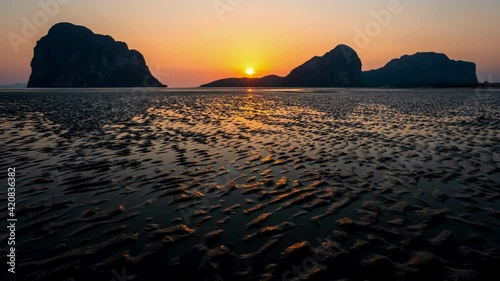 4K Motion timelapse of sunset at Pak Meng beach, Trang, Thailand
 photo