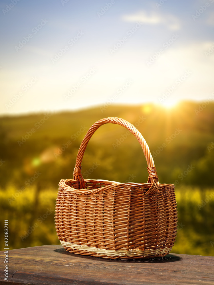 Wooden empty basket and summer time Wooden empty basket and summer time