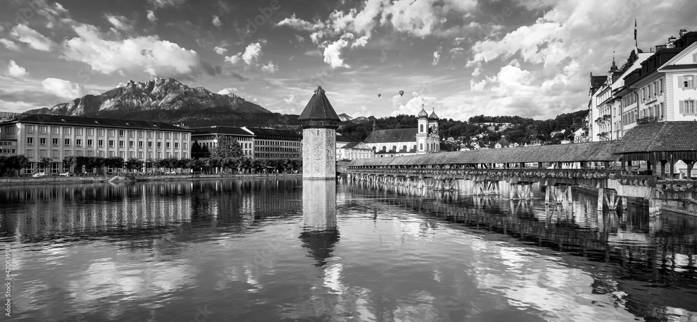 Sunset in historic city center of Lucerne with famous Chapel Bridge and lake Lucerne (Vierwaldstattersee), Canton of Lucerne, Switzerland