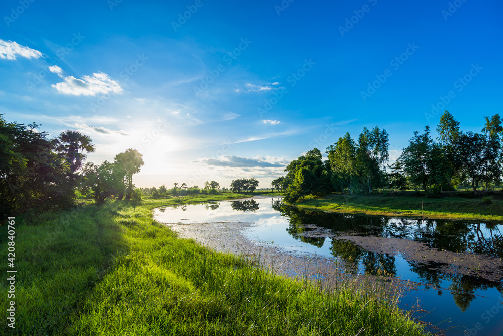 Landscape with Morning sunrise over the river in countryside.