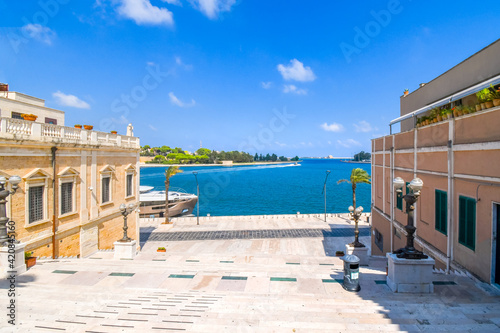 View of the Bay of Brindisi and waterfront promenade from the steps end of the Appian Way in Brindisi Italy