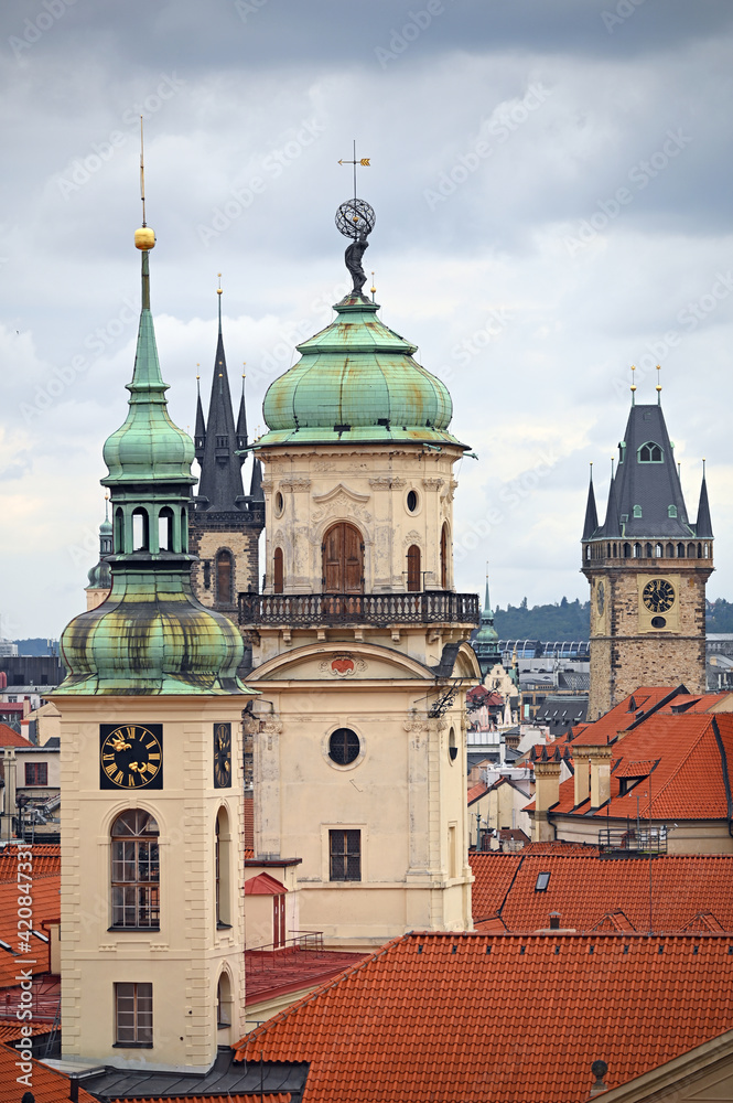 churches and clock towers in old town Prague