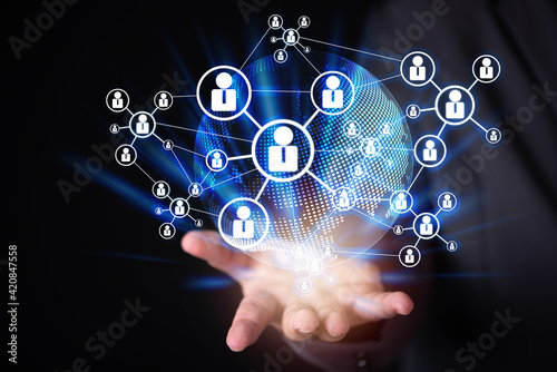 businessman hand holding virtual structure networking people connection