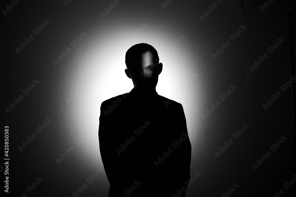 silhouette of a man in the dark. silhouette of a man in the dark.