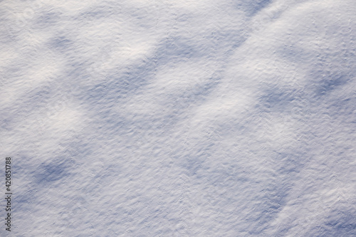 White fluffy snow, texture or background, top view.