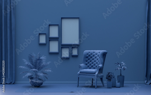 Wall mockup with six frames in solid flat pastel dark blue color, monochrome interior modern living room with single chair and plants, 3d rendering