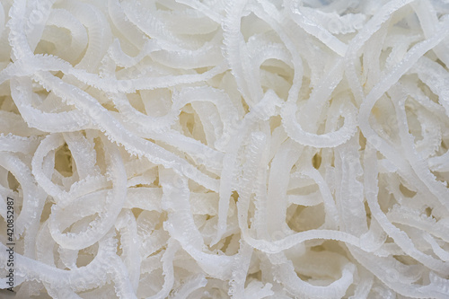 shredded pork closeup isolated on black