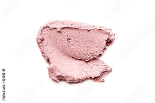 Smear of cosmetic clay isolated on a white background.