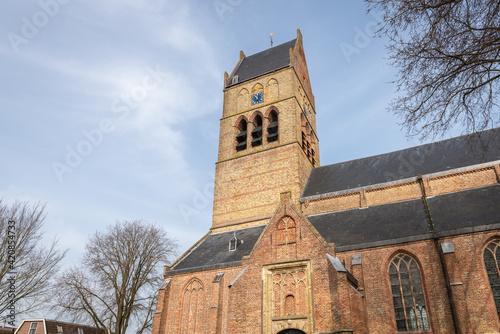 Side view of the upper part of St. Martin medieval Protestant church in Bolsward, The Netherlands