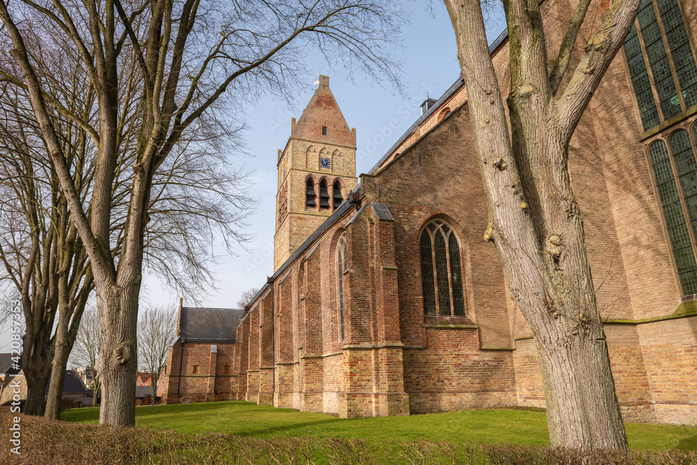 Side view of of the Great St. Martin medieval Protestant church in Bolsward, The Netherlands