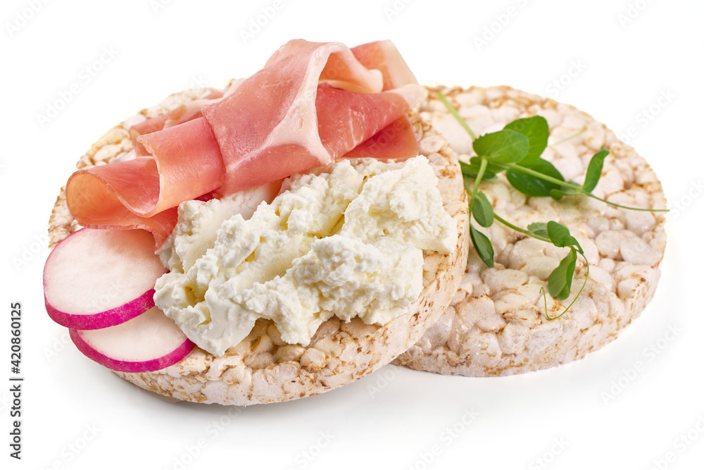 Rice cakes with cream cheese and jamon, isolated on white background