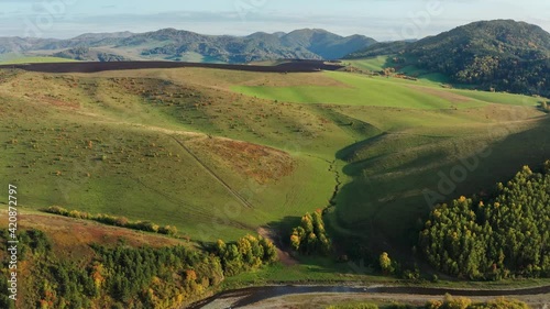 Altai mountains in autumn. Cherginsky ridge. Altayskoye village. Surroundings of Belokurikha resort. Aerial view.