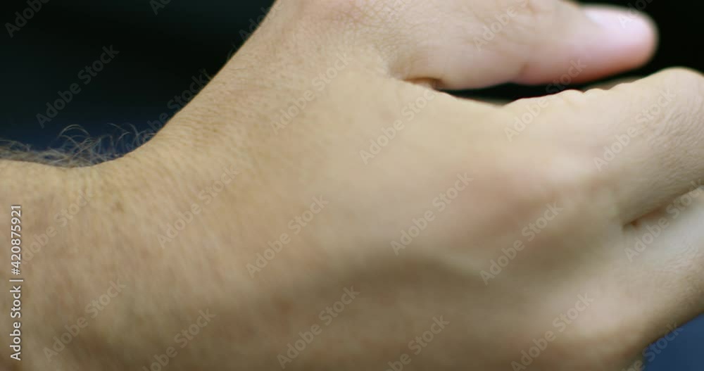 Close up view of a hand of a man moving the gear lever of a car - RED Camera 4K Close up view of a hand of a man moving the gear lever of a car - RED Camera 4K