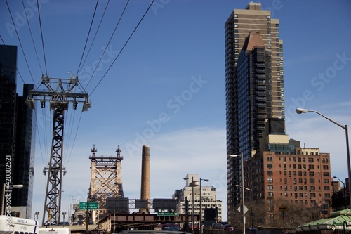 MANHATTAN, NEW YORK - MAY 7, 2014: Brooklyn Bridge view of the Roosevelt Island Tramway