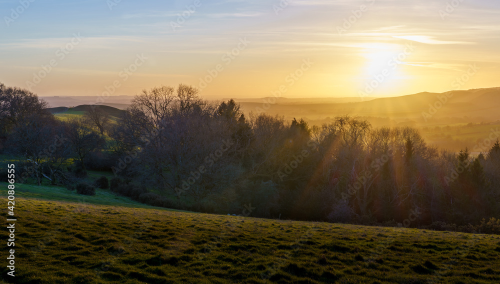 scenic Westerly view with a golden sunset across the Pewsey Vale valley