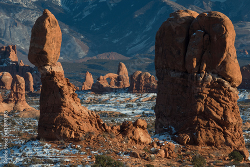 USA, Utah. Balanced rock and Turret Arch at sunset, Arches National Park.
