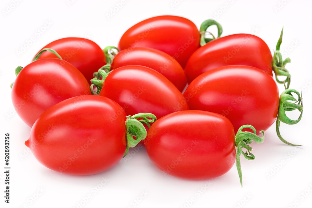 Bunch of San Marzano tomatoes. Whole plum cherry juicy tomato isolated on white. Italian fresh vegetables. Organic raw vegan healthy food vegetable. Farm market product. Front view, macro, studio Bunch of San Marzano tomatoes. Whole plum cherry juicy tomato isolated on white. Italian fresh vegetables. Organic raw vegan healthy food vegetable. Farm market product. Front view, macro, studio