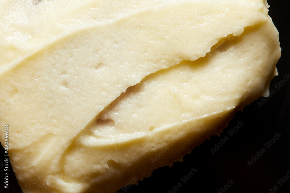 Cinnamon roll cream top, close up, overhead view Cinnamon roll cream top, close up, overhead view