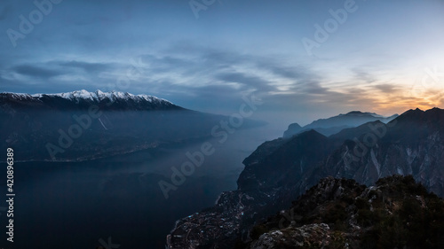 Lake Garda with Limone sul Garda down by the lake; view south, high angle view, Lombardia, Italy photo