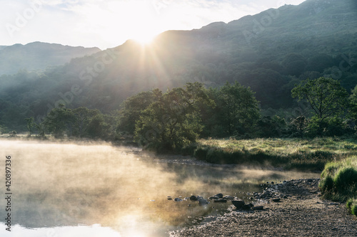 Llyn Gwynant lake on sunny day, Snowdonia, Llanberis, Gwynedd, UK photo