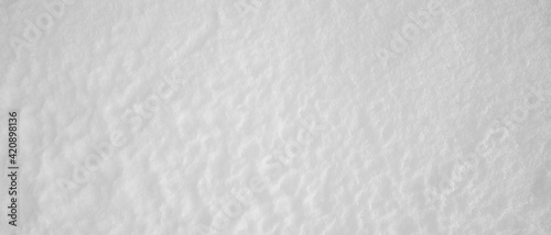 White snow with texture. Fresh snow background