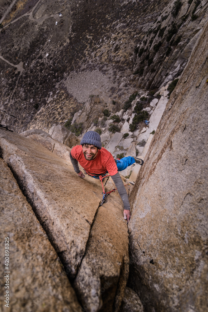 Climber trad climbing, Pine Creek, Bishop, California, USA Climber trad climbing, Pine Creek, Bishop, California, USA