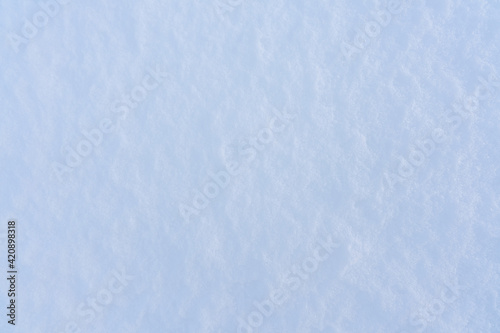 Blue snow with texture. fresh snow background