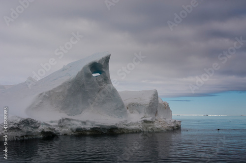 Seascape with iceberg, Vibebukta, Austfonna, Nordaustlandet, Svalbard, Norway photo