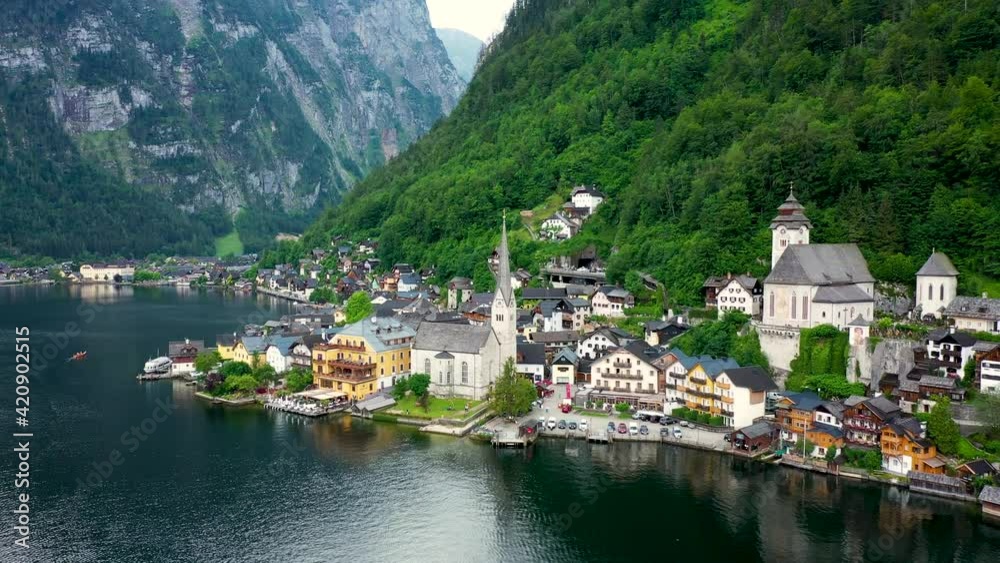 View of famous Hallstatt mountain village in the Austrian Alps at beautiful light in summer, Salzkammergut region, Hallstatt, Austria. Hallstatt village on Hallstatter lake in Austrian Alps. View of famous Hallstatt mountain village in the Austrian Alps at beautiful light in summer, Salzkammergut region, Hallstatt, Austria. Hallstatt village on Hallstatter lake in Austrian Alps.