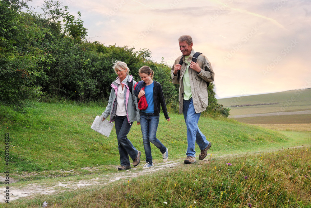 Family of three exploring countryside, Eastbourne, East Sussex, United Kingdom Family of three exploring countryside, Eastbourne, East Sussex, United Kingdom