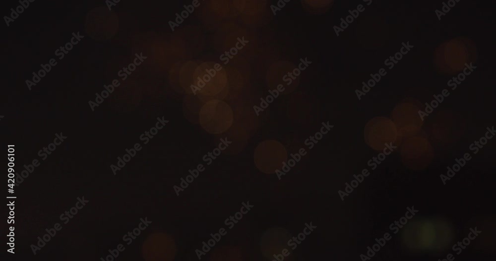 Blurry fireworks are going off in night sky over the city, New Years eve, 4k Blurry fireworks are going off in night sky over the city, New Years eve, 4k