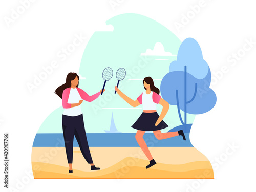 a pair of girls playing badminton