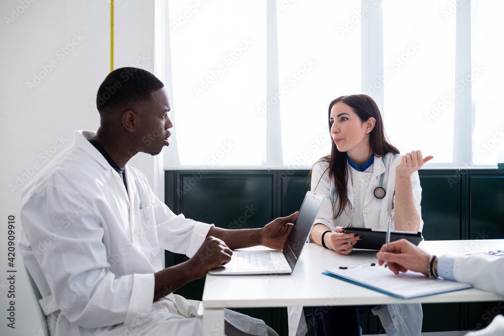 Doctors having discussion in meeting room