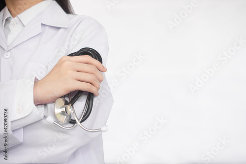Doctor hold stethoscope standing copy spec
