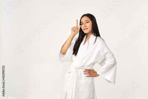 Beautiful girl wearing white bathrobe