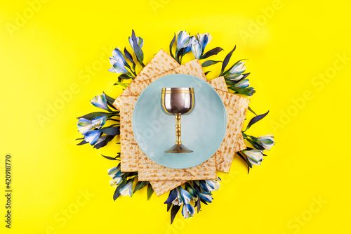 Matzos bread with kiddush cup. Jewish pesah holiday. photo