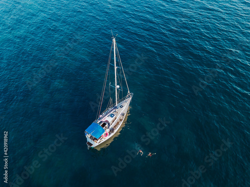  Sailboat afloat on sea, Italy photo