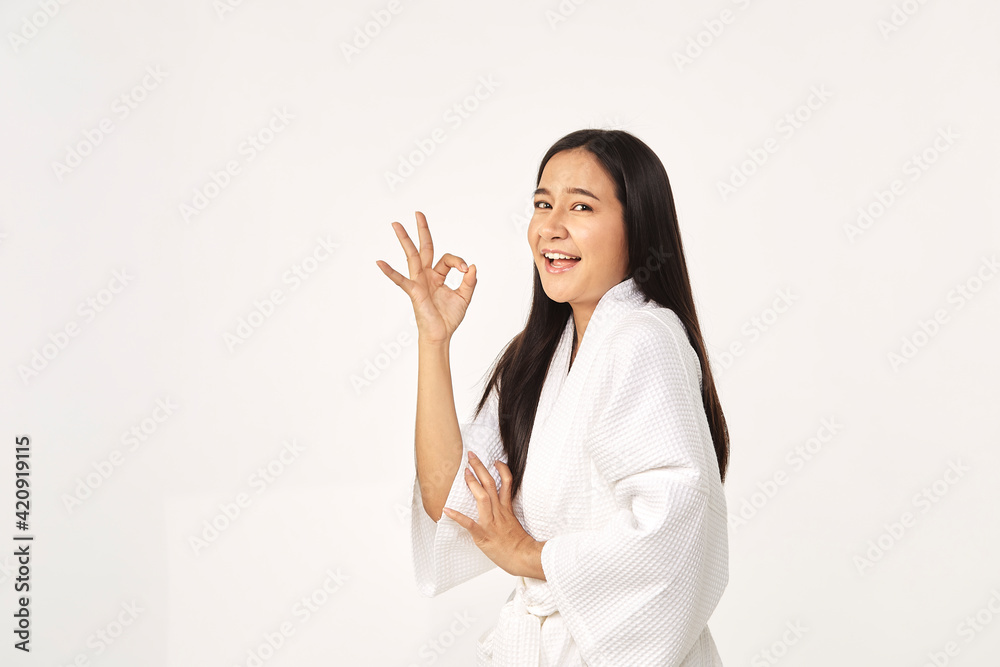 Beautiful girl wearing white bathrobe Beautiful girl wearing white bathrobe
