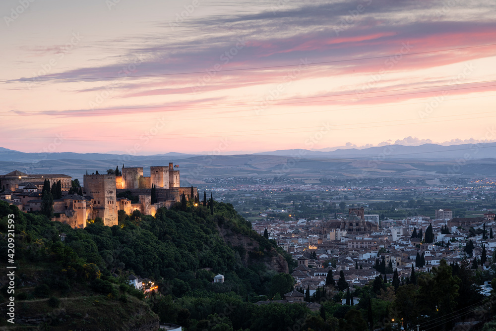 View of the Alhambra from a viewpoint at sunset