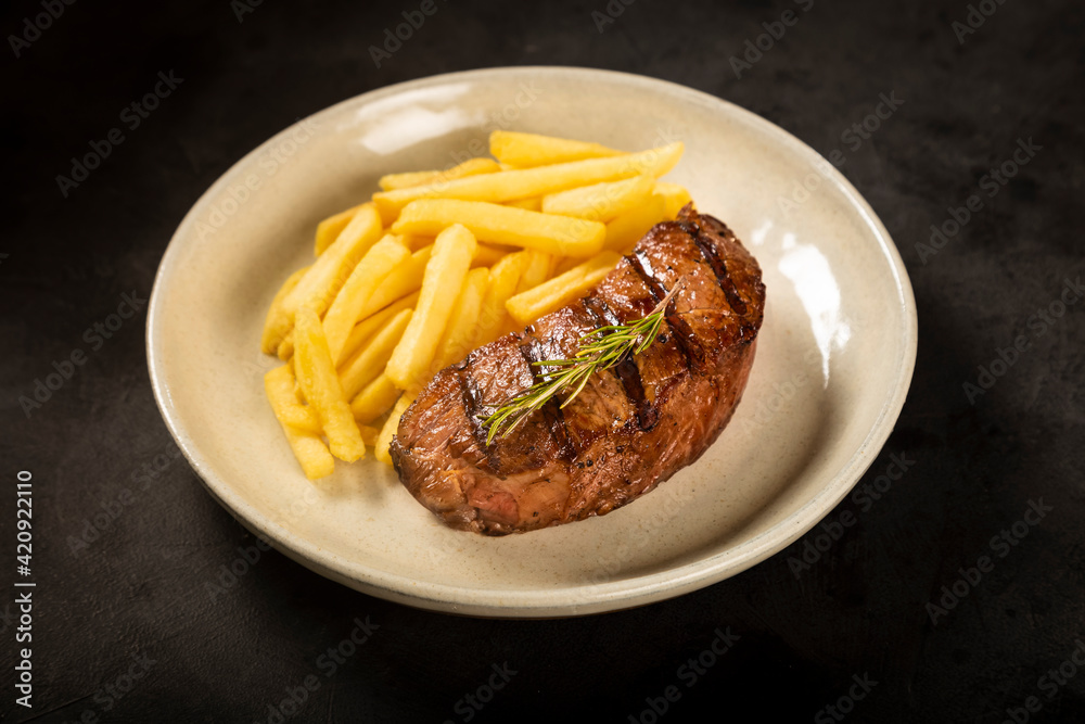 Grilled steak with french fries.
