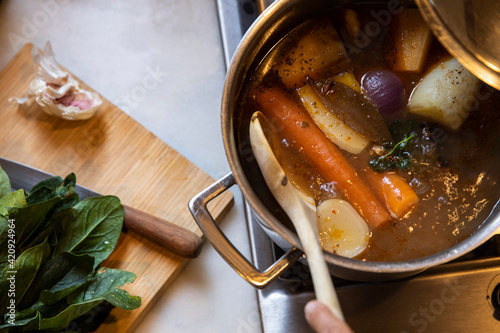 High angle close up of pot of vegetable stew. photo