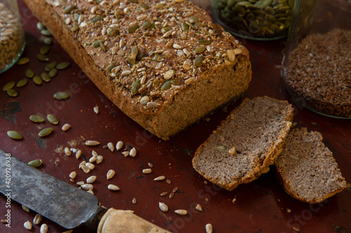 High angle close up of seeded loaf of bread.